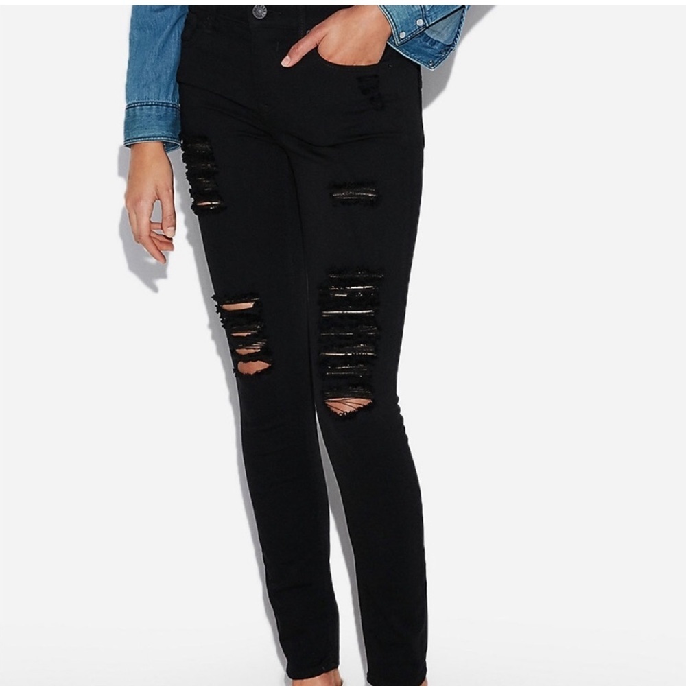 Women’s express black mid rise very distressed skinny jeans legging size 8